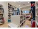 Well-organized walk-in closet with custom shelving and ample storage at 16716 S 32Nd Ln, Phoenix, AZ 85045