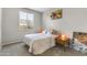 Cozy bedroom featuring neutral walls, carpet, and stylish bedside lamps at 1749 W Posada St, Coolidge, AZ 85128
