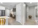 Bright hallway adjacent to the kitchen, showcasing neutral tones and offering access to other rooms at 1749 W Posada St, Coolidge, AZ 85128