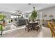 Open concept living and dining area featuring tile floors and access to the outdoor patio at 1749 W Posada St, Coolidge, AZ 85128
