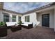Inviting backyard patio furnished with stylish outdoor seating, perfect for relaxation and entertaining at 18564 W Cathedral Rock Dr, Goodyear, AZ 85338