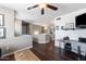 Bright upstairs loft area with hardwood flooring and a workspace setup, providing a versatile and functional space at 1870 E Oakland St, Gilbert, AZ 85295