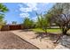 Private backyard area with citrus trees and gravel bed at 2043 E Quartz St, Mesa, AZ 85213