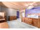 Spacious bedroom featuring light colored carpet, a wood ceiling and a cozy atmosphere at 2043 E Quartz St, Mesa, AZ 85213
