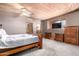 Charming bedroom features wood ceiling, and neutral walls, providing a cozy and inviting atmosphere at 2043 E Quartz St, Mesa, AZ 85213