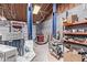 Spacious garage with high ceilings and a car lift, perfect for mechanics at 2043 E Quartz St, Mesa, AZ 85213