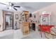 Finished living space with vintage popcorn machine, wet bar, and wood accents at 2043 E Quartz St, Mesa, AZ 85213