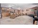 Large living room with carpet, seating and entertainment center at 2043 E Quartz St, Mesa, AZ 85213