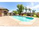 Stunning pool with a cabana and lush landscaping offering the perfect outdoor oasis at 2043 E Quartz St, Mesa, AZ 85213