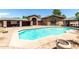 Gorgeous pool, patio and stone buildings; an ideal setting for entertaining and relaxation at 2043 E Quartz St, Mesa, AZ 85213