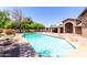 Beautiful pool with ample patio space, ideal for outdoor entertaining and relaxation at 2043 E Quartz St, Mesa, AZ 85213