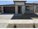 Beautiful single-story home featuring a two-car garage and a low-maintenance desert landscape at 20615 N 226Th Dr, Surprise, AZ 85387