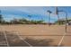 Full-sized basketball court at the community park featuring new court, hoops, and a shaded seating area at 22322 N 77Th St, Scottsdale, AZ 85255