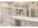 Bright bathroom featuring double sink vanity, soaking tub and shower at 22322 N 77Th St, Scottsdale, AZ 85255