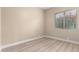 Empty bedroom with hardwood floors and window at 22322 N 77Th St, Scottsdale, AZ 85255
