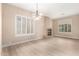 Bright living room showcases an elegant fireplace and plantation shutters at 22322 N 77Th St, Scottsdale, AZ 85255