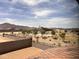 View of the neighborhood park with shade structures and playground equipment, surrounded by homes at 22359 W Monona Ln, Surprise, AZ 85387