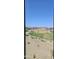 Scenic view of a nearby park and playground, showcasing the home's proximity to community amenities at 22359 W Monona Ln, Surprise, AZ 85387