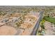 Full aerial view of an expansive property and its potential in a well-established desert community at 22819 E Ray Rd, Mesa, AZ 85212