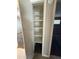 Open closet featuring shelving for ample storage space at 2401 W Weldon Ave, Phoenix, AZ 85015