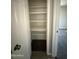 Spacious closet with ample shelving for organized storage and easy access to household items at 2401 W Weldon Ave, Phoenix, AZ 85015