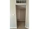 Neutral hallway featuring an air vent and access to additional rooms at 2401 W Weldon Ave, Phoenix, AZ 85015