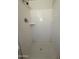 Shot of the stand-up shower in a bathroom, next to the toilet and vanity at 2401 W Weldon Ave, Phoenix, AZ 85015