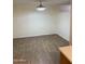 Dining room with neutral paint, ceiling fan and plank tile flooring at 2569 W Berridge Ln # D-115, Phoenix, AZ 85017