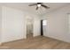 A spacious main bedroom features an en-suite bathroom and hardwood floors at 28072 N Quartz Dr, San Tan Valley, AZ 85143