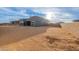 View of the modern home exterior, featuring a spacious backyard ready for personalization and landscaping at 28421 N 59Th Way, Cave Creek, AZ 85331