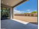 Spacious backyard featuring a gravel area and privacy wall, as seen from the covered patio at 28421 N 59Th Way, Cave Creek, AZ 85331