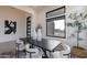 Stylish dining area featuring modern chairs, a dark wood table, and contemporary decor at 28421 N 59Th Way, Cave Creek, AZ 85331