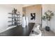 Elegant dining area with modern furnishings, decorative vases, and stylish shelving at 28421 N 59Th Way, Cave Creek, AZ 85331