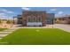 Stunning modern home featuring a sleek design, artificial grass, and contemporary architecture at 28421 N 59Th Way, Cave Creek, AZ 85331