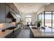 Contemporary kitchen featuring a center island, modern appliances, and an open layout at 28421 N 59Th Way, Cave Creek, AZ 85331