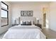 Serene main bedroom features a plush bed, stylish lamps, and contemporary wall art for relaxation and comfort at 28421 N 59Th Way, Cave Creek, AZ 85331