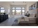 Bright main bedroom with large windows, stylish furniture, decor and bedding, and elegant decor at 28421 N 59Th Way, Cave Creek, AZ 85331