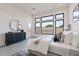 Bright main bedroom with many windows, and stylish furniture for a comfortable and stylish home at 28421 N 59Th Way, Cave Creek, AZ 85331