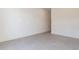 Simple room showcasing tile flooring, neutral colors and a door offering clean lines and a blank canvas at 28421 N 59Th Way, Cave Creek, AZ 85331