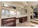 Bathroom offering dual sinks with spacious countertops, updated fixtures, and a walk-in shower at 3202 W Knudsen Dr, Phoenix, AZ 85027