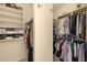 Organized walk-in closet with shelving, hanging rods, and ample storage space for all your wardrobe needs at 3202 W Knudsen Dr, Phoenix, AZ 85027