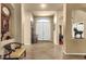 Grand foyer with tile flooring, high ceilings, and a view of the front entrance at 3202 W Knudsen Dr, Phoenix, AZ 85027