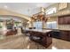 Modern kitchen with island seating, a view to the Gathering room, and ample light at 3202 W Knudsen Dr, Phoenix, AZ 85027