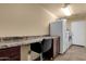 Functional laundry room with built-in desk, counter space, and modern washer and dryer at 3202 W Knudsen Dr, Phoenix, AZ 85027