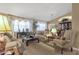 Spacious living room with natural light, comfortable furniture, and an open layout at 3202 W Knudsen Dr, Phoenix, AZ 85027