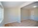 Carpeted bedroom with a large window at 3249 E Sunnyside Ln, Phoenix, AZ 85032