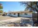 This charming home includes a spacious driveway, complemented by mature landscaping and a freshly painted exterior at 3249 E Sunnyside Ln, Phoenix, AZ 85032