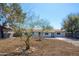 Charming single-story home featuring desert landscaping and a classic white exterior, perfect for low-maintenance living at 3249 E Sunnyside Ln, Phoenix, AZ 85032