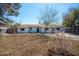 Inviting single-story home showcasing desert-friendly landscaping and a freshly painted exterior, ideal for modern living at 3249 E Sunnyside Ln, Phoenix, AZ 85032
