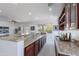This spacious bar offers a perfect transition from the living space to the backyard oasis at 3574 E Glacier Pl, Chandler, AZ 85249